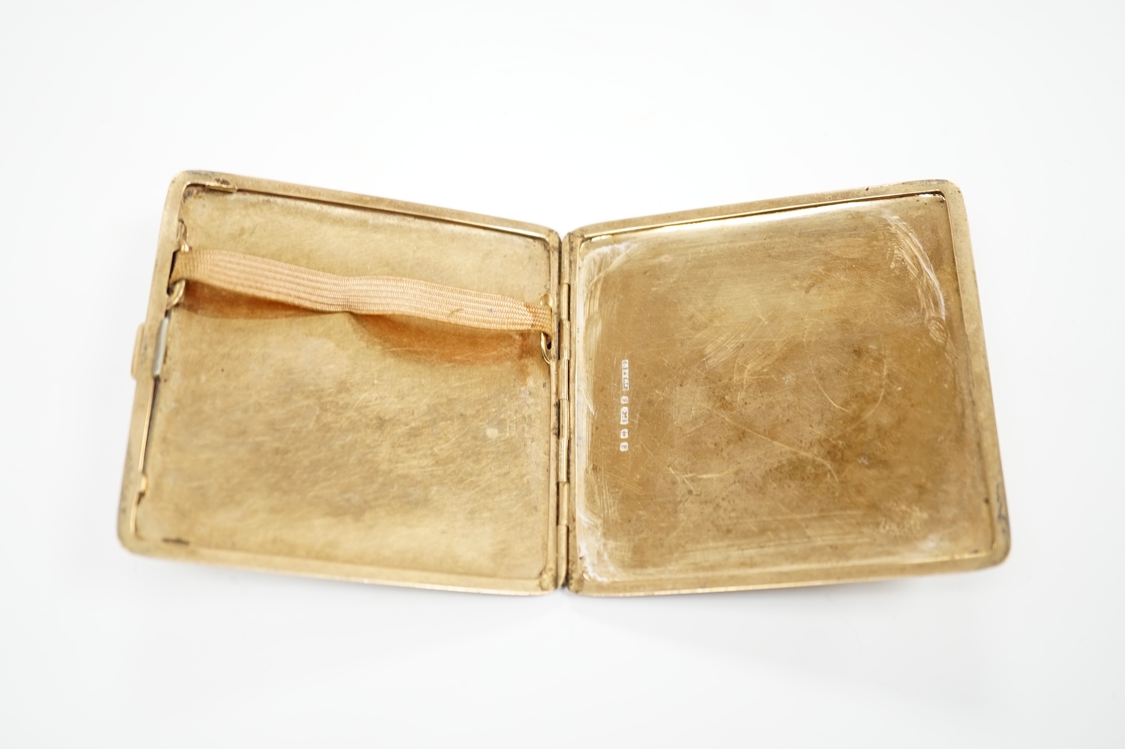 A George V square engine turned 9ct gold cigarette case by S. Blanckensee & Sons Ltd., Birmingham, 1928, 85MM, gross weight 106 grams.